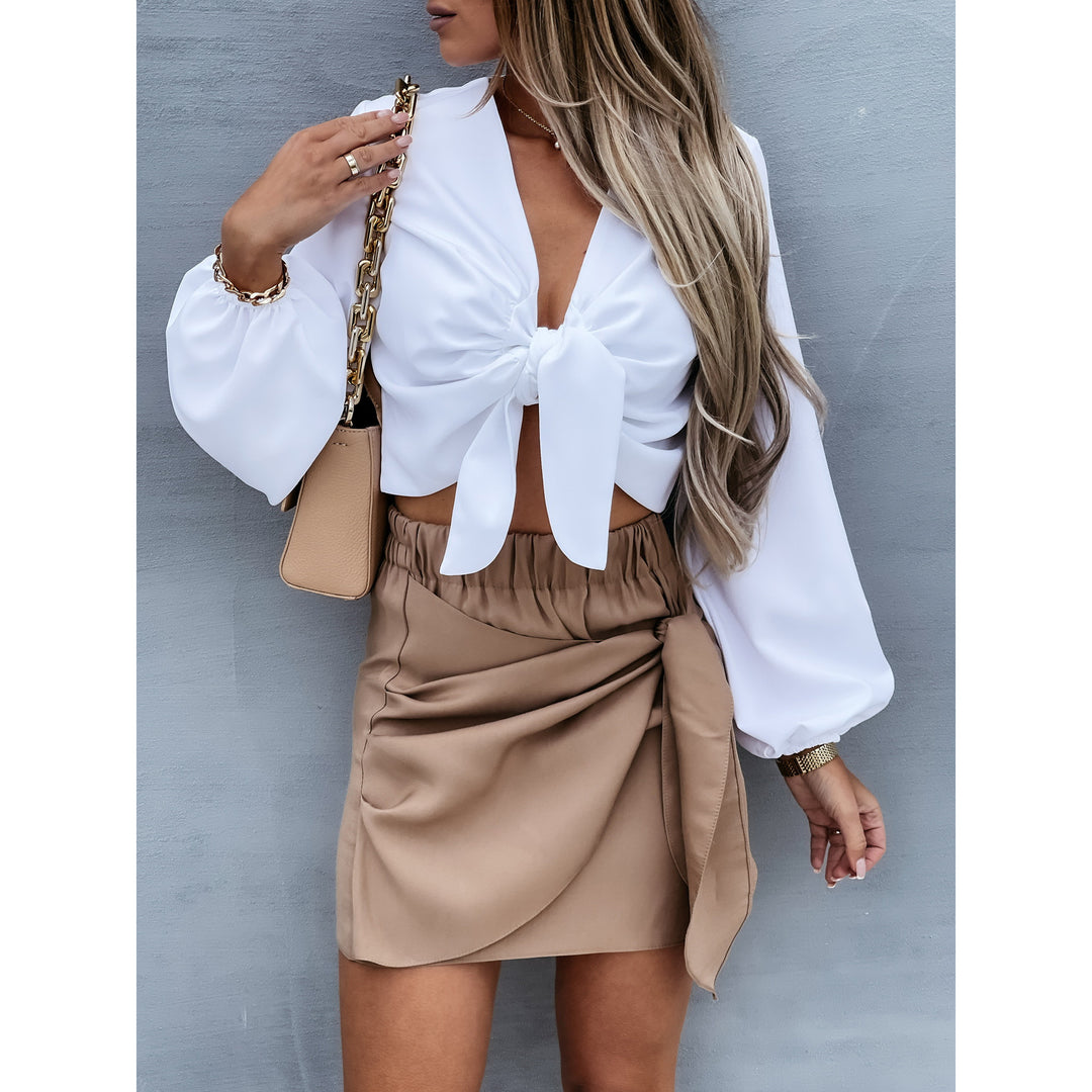Damer Cropped Bluse med dekorativ knude og vidte ærmer Stiila