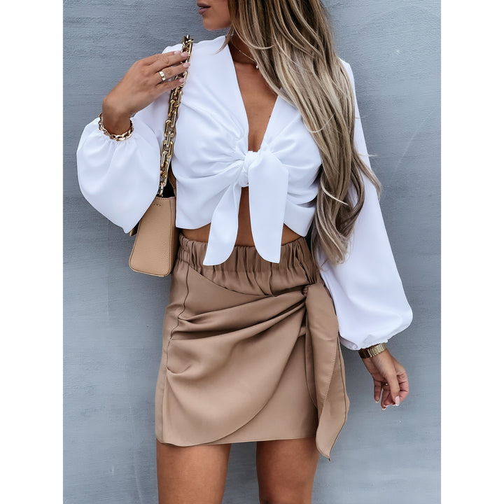Damer Cropped Bluse med dekorativ knude og vidte ærmer Stiila