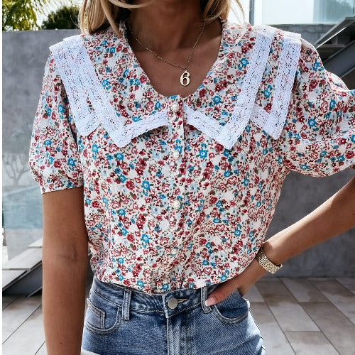 Damebluse med floraltryk og spidse detaljer Stilla