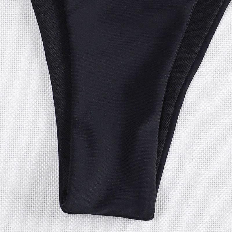 Dame bikiniunderdel med justerbare bindebånd og elegante metalringe Skovae