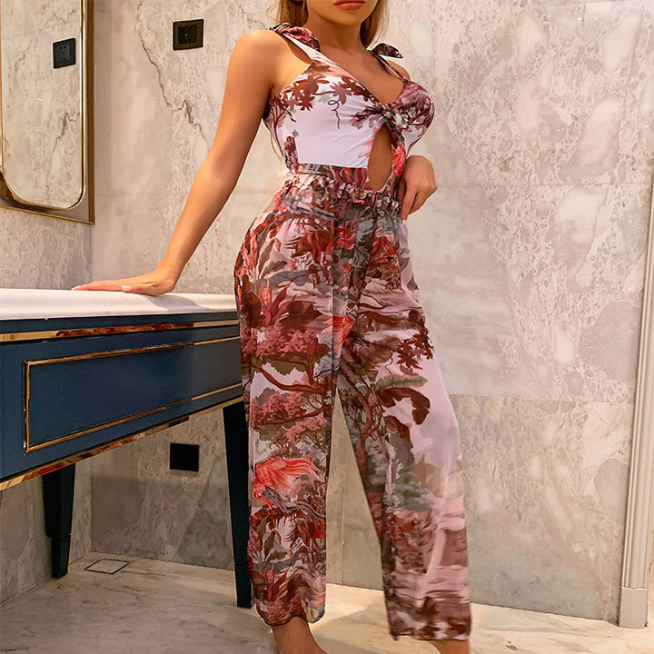 Dame flettet jumpsuit med blomstret design Skovae