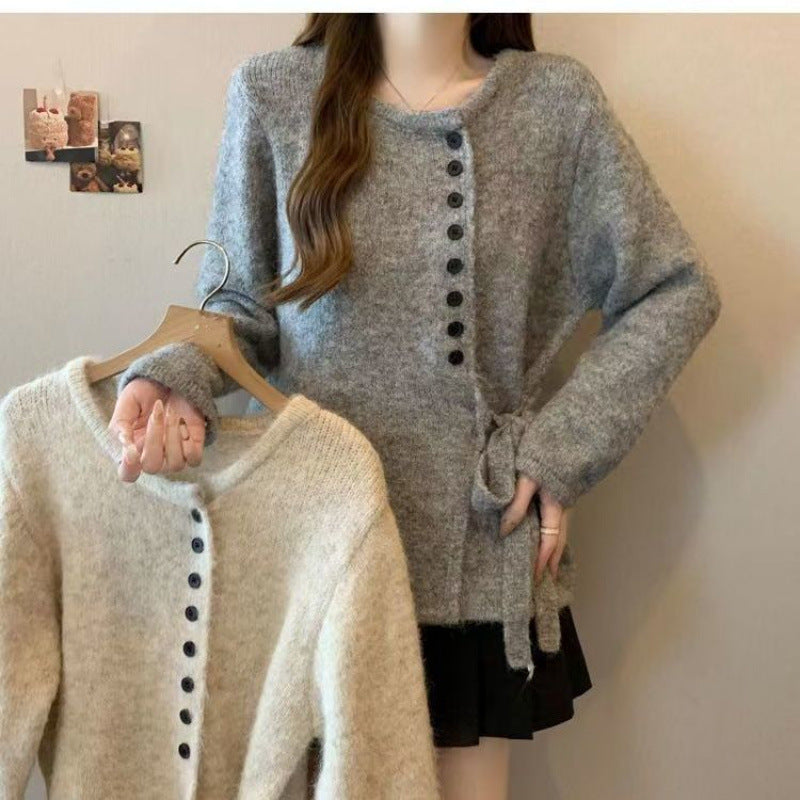 Kvinders stilfulde cardigan med fashionable knapdetaljer og bælte Stilla