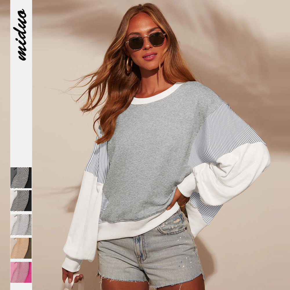 Damer kreativ sweatshirt med asymmetrisk ærmedesign Stilla