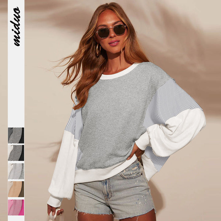 Damer kreativ sweatshirt med asymmetrisk ærmedesign Stilla