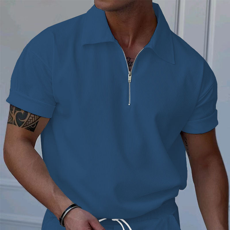 Herrer polo med kort lynlås og struktureret design Stilla