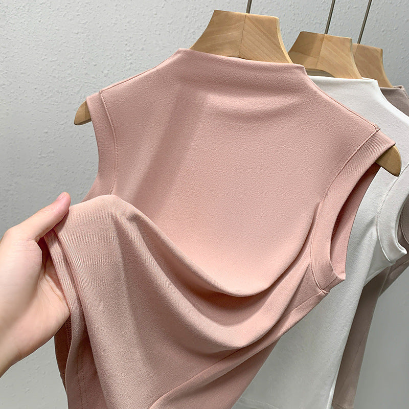 Dame ærmeløst top med elegant høj krave og flydende materiale Stilla