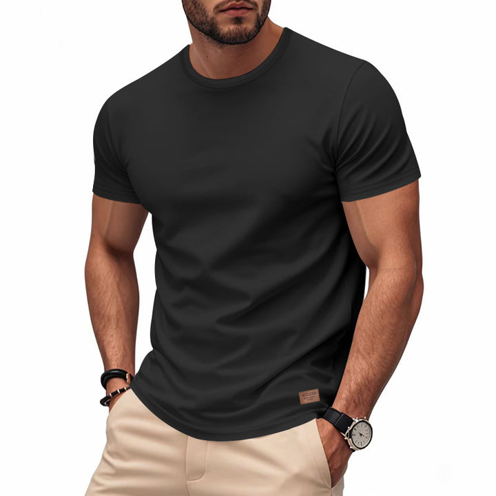 Herrer nan slankt Rundhals-T-shirt i glat stretchjersey med diskret læder-logoapplikation Skovae