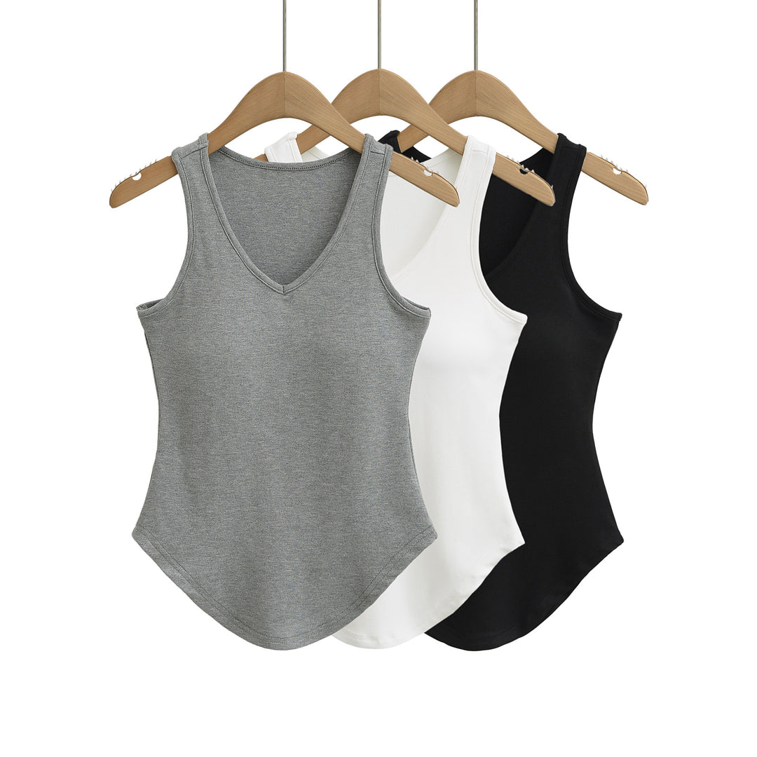 Dame sporty V-hals tanktop i åndbart materiale med tætsiddende snit Stilla
