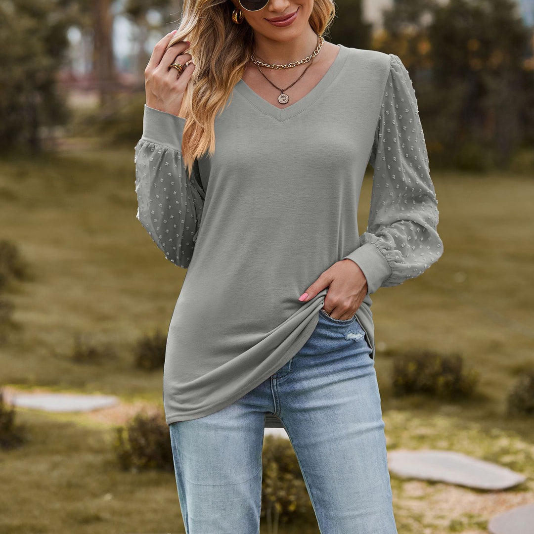Damebluse med puffærmer og struktureret design Stilla