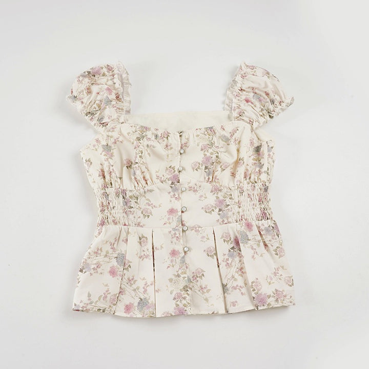 Damebluse med blomsterdesign og flæseærmer Skovae