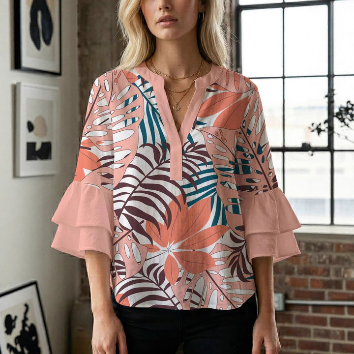 Dame bluse med voluminøse ærmer og kreativt trykdesign Skovae