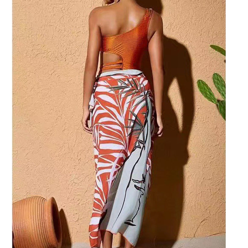Dame one-piece badedragt med smart cut-out og elegant overkjole Stilla
