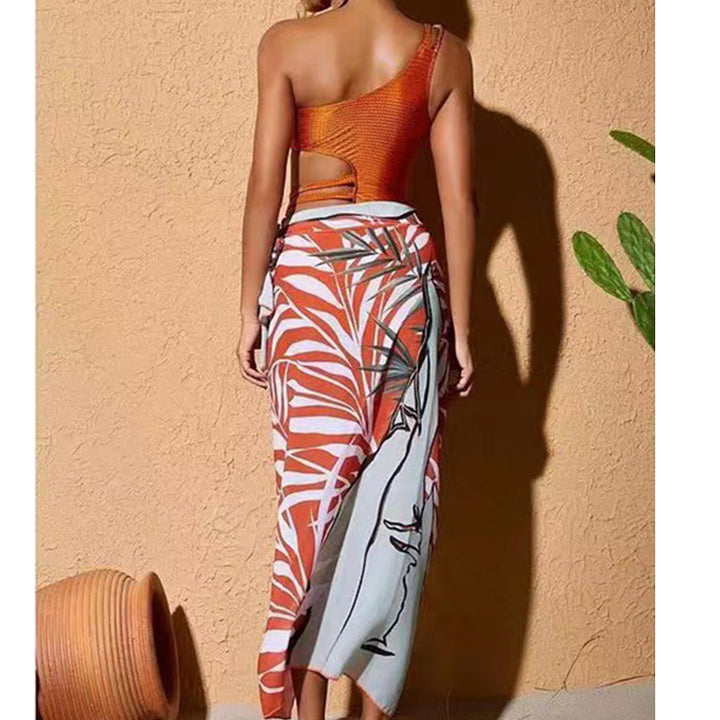 Dame one-piece badedragt med smart cut-out og elegant overkjole Stilla