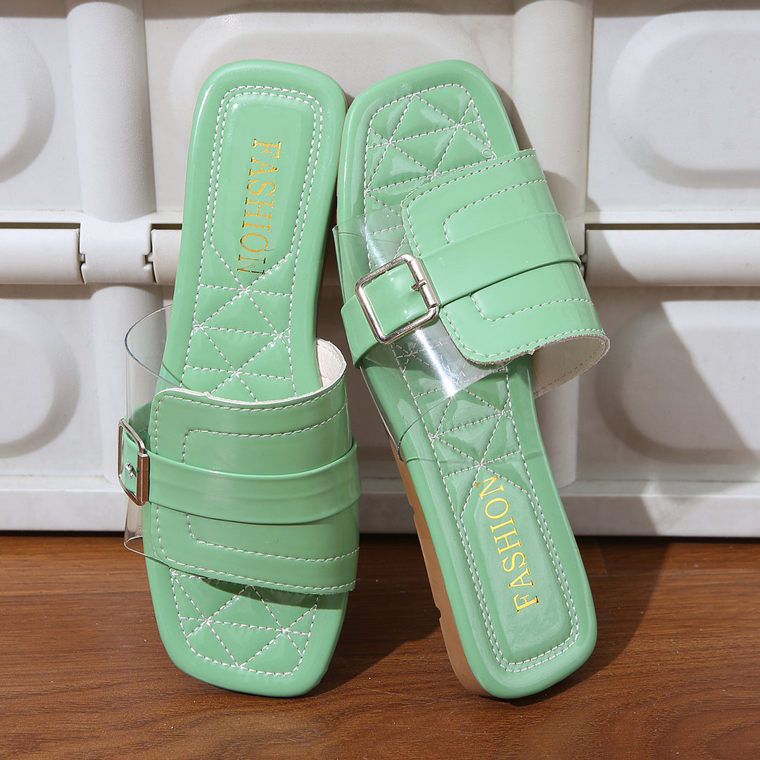Dame slide-sandaler med gennemsigtig rem og moderne kædeforbindelse Stilla