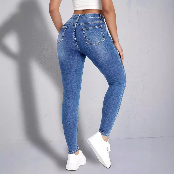 Dame Skinny Jeans med farverige sommerfugleapplikationer Stilla