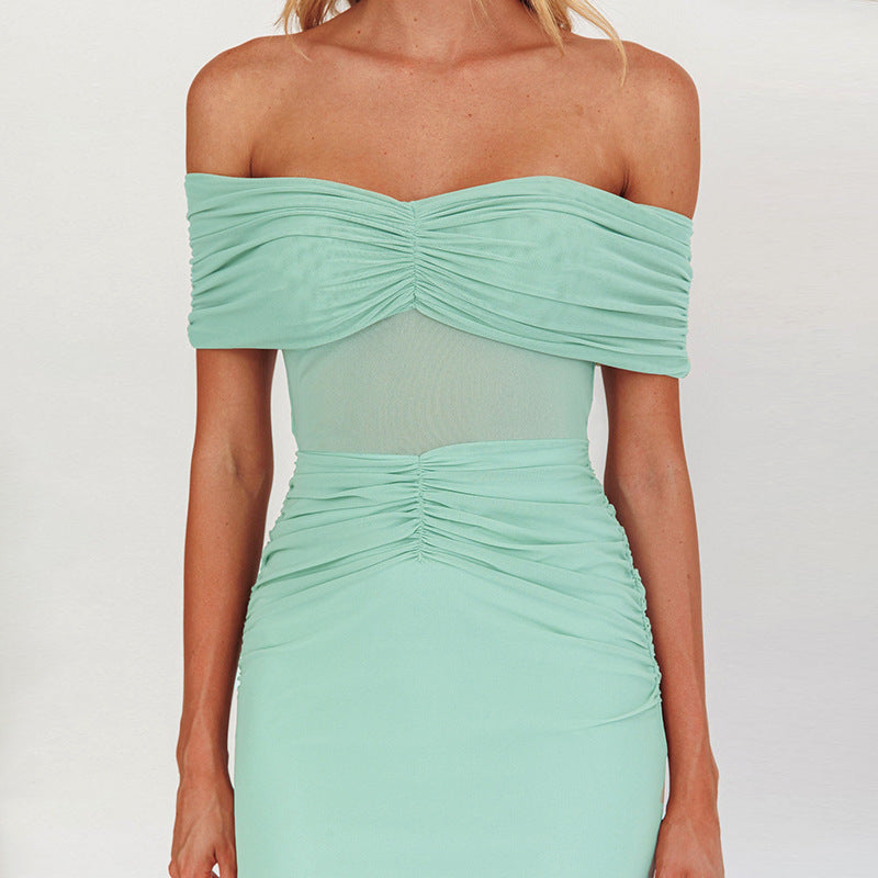 Dame maxikjole med off-shoulder design og elegant flæsedetail Stilla