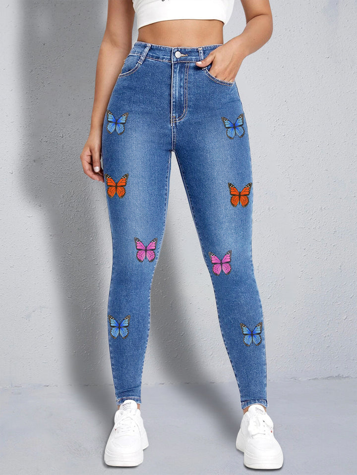 Dame Skinny Jeans med farverige sommerfugleapplikationer Stilla