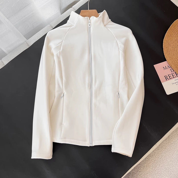 Kvindernes åndbare sportjakke med høj krave Stilla