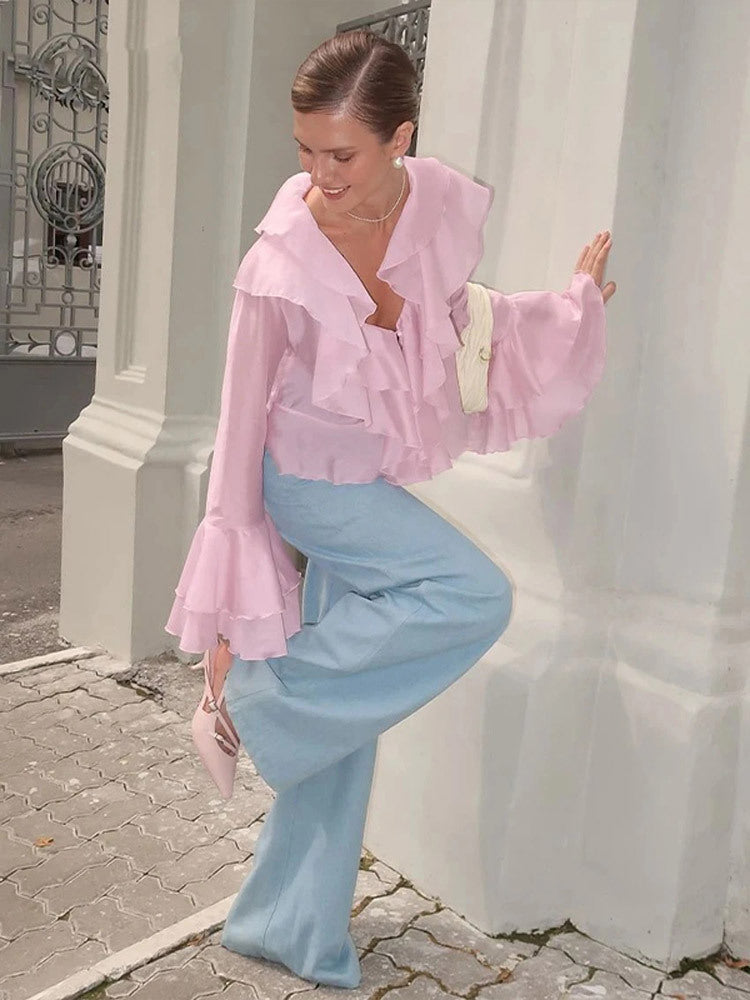 Dame rynkebluse med voluminøse ærmer og elegant design Stilla