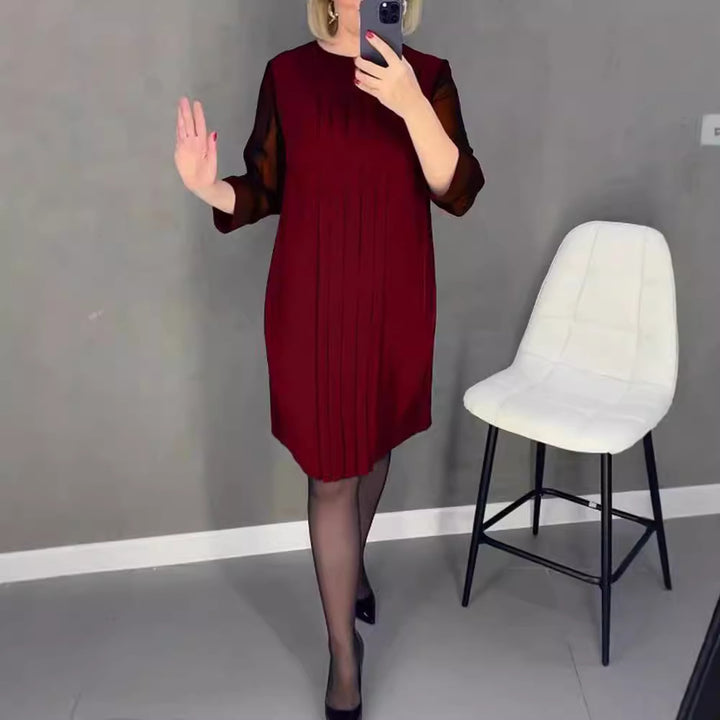Dame Plisse aften kjole med gennemsigtige ærmer og elegant snit Stilla