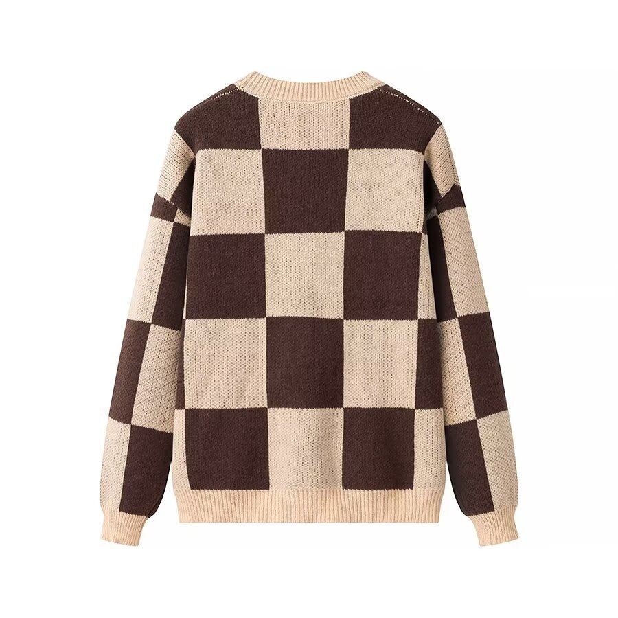 Dame Oversize Ternet Pullover med Rundhalsudskæring og fin Strikkestruktur Stilla