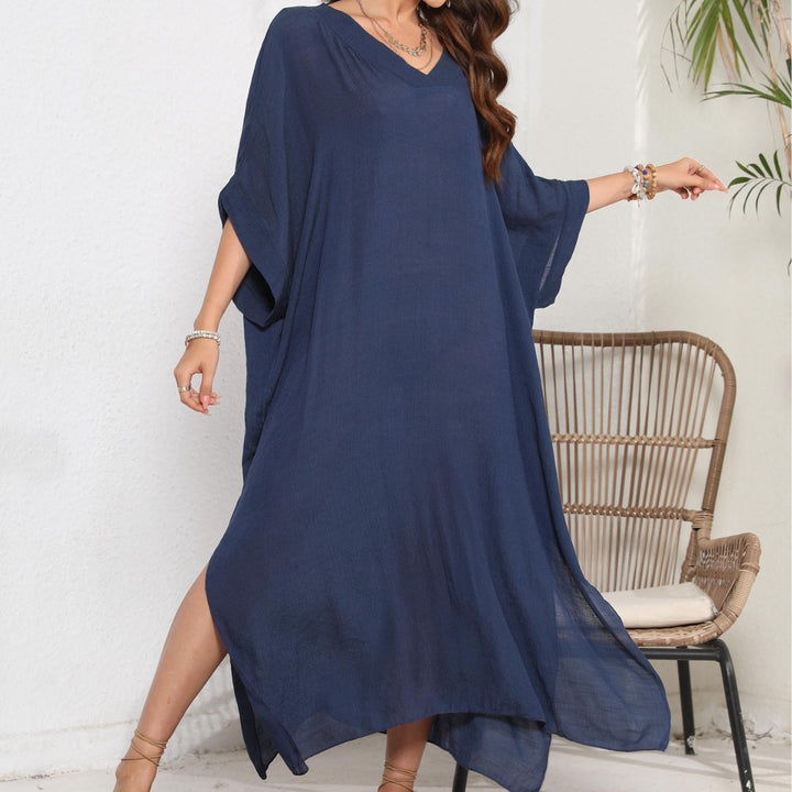 Dame Kaftan i afslappet oversized stil med dyb V-udskæring og sidelæg Stilla