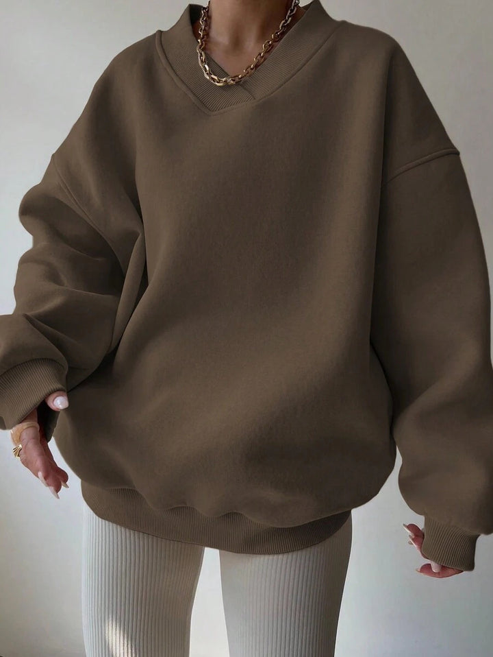 Kvindernes oversized sweatshirt med V-hals og brede ærmer Skovae