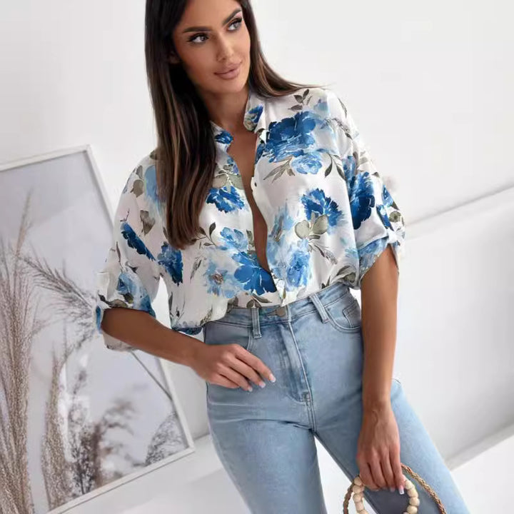 Damebluse med blomstermønster og dropped skuldre Stilla
