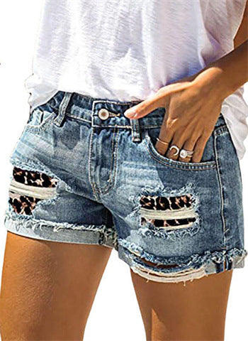 Dame jeans-shorts med moderne ødelæggelsesdetaljer og dyreprint Stilla