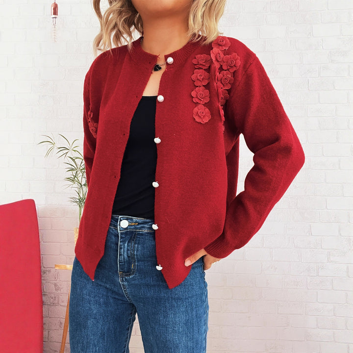 Kvinders cardigan med blomsterapplikationer og knapdetaljer Stilla