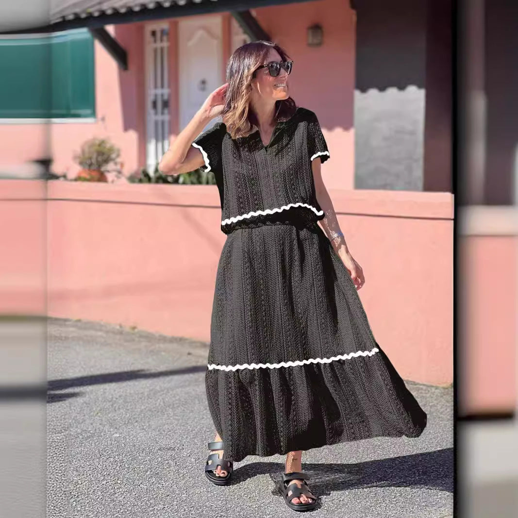 Kvindernes maxikjole med voluminøs skørt og elegant flæse Skovae