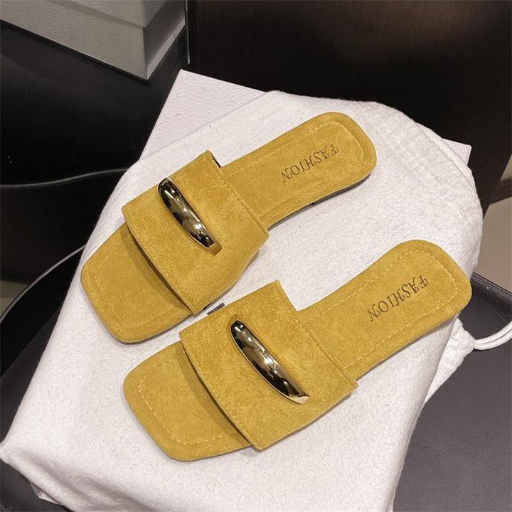 Dame clogs i elegant design med gyldne accenter og blød, skridsikker sål Stilla