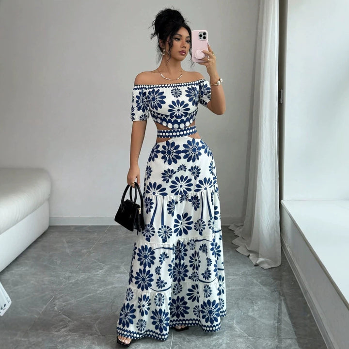 Dame maxikjole med blomstret design og trendy off-shoulder udskæring Skovae