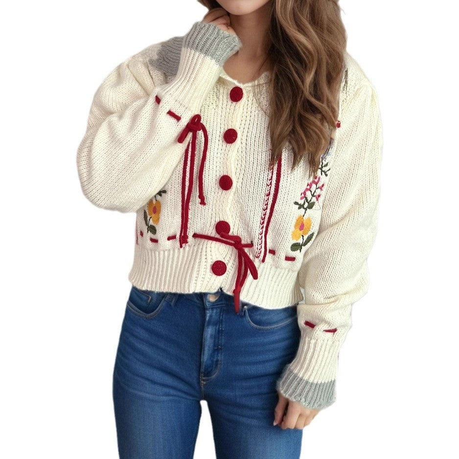 Kvinde cardigan med blomst broderi og moderne snorelukning Stilla