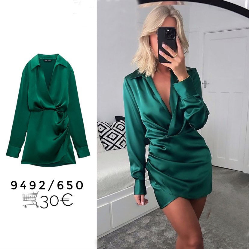 Dame indpakningsbluse med elegant knapliste og flæsedetaljer Stilla