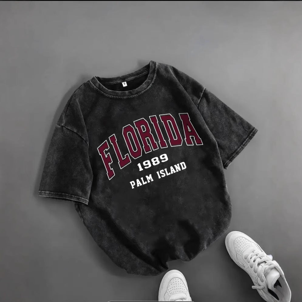 Dame T-shirt med kreativ Florida-print og komfortabel oversized-snit Stilla