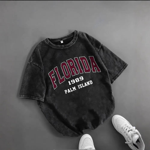 Dame T-shirt med kreativ Florida-print og komfortabel oversized-snit Stilla