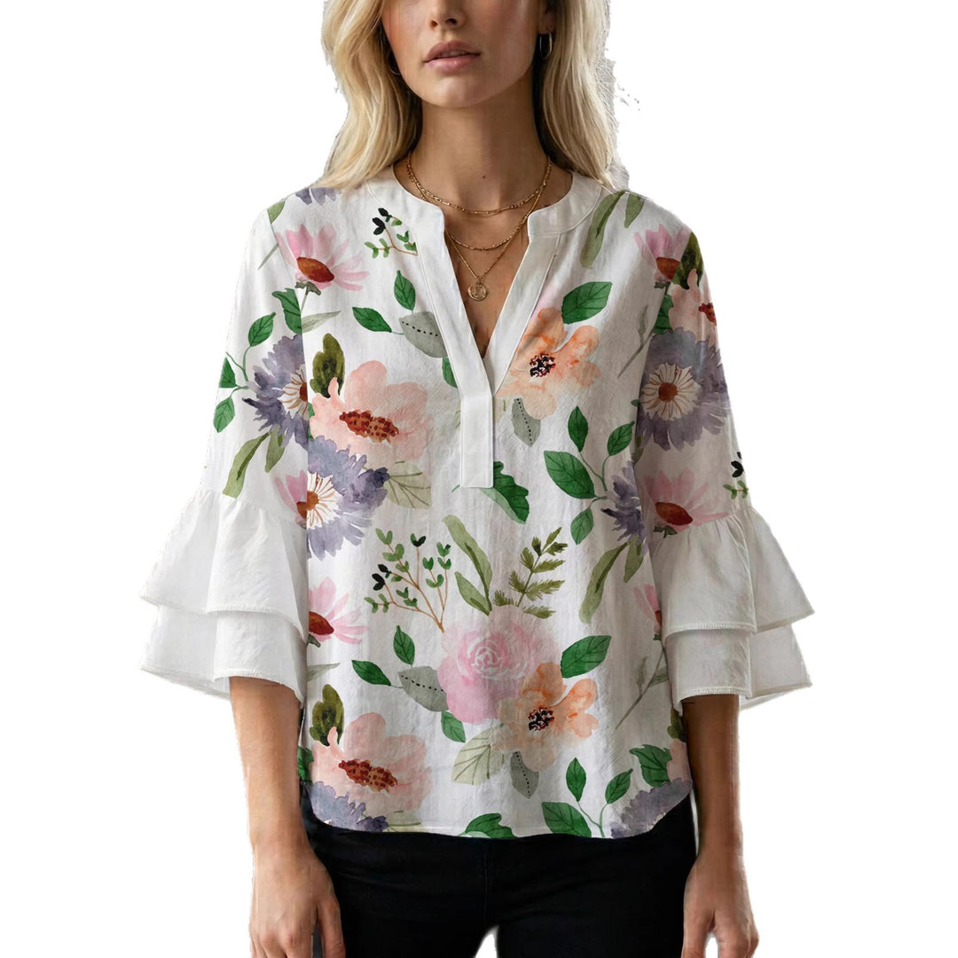 Damebluse med flæsedetaljer og iøjnefaldende dyreprint Skovae