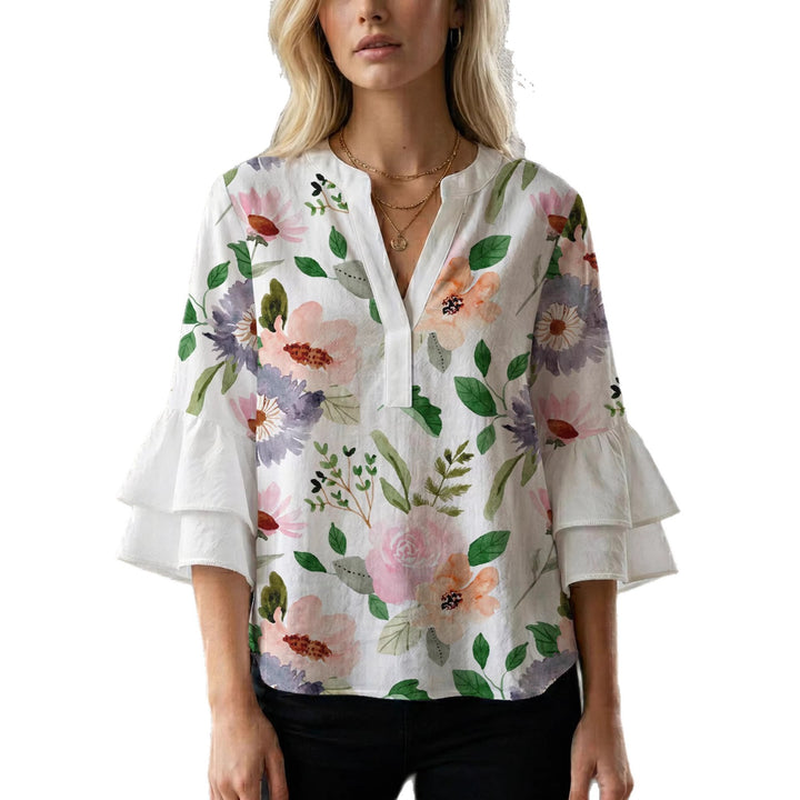 Damebluse med flæsedetaljer og iøjnefaldende dyreprint Skovae