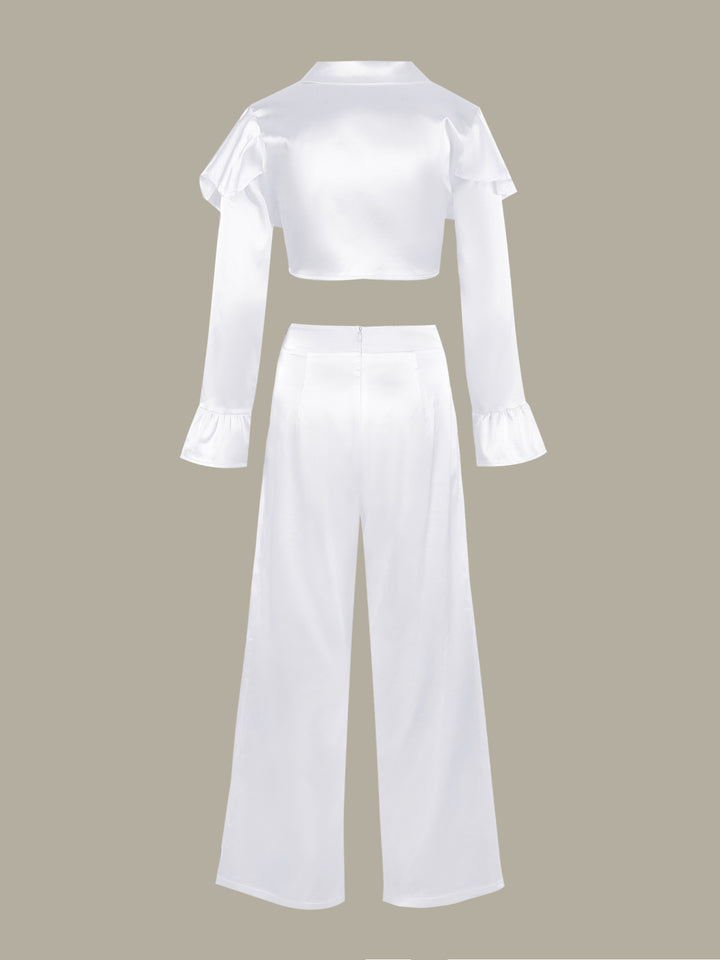 Dameensemble med figursyet crop-top og elegant højhvidt bukser Stilla