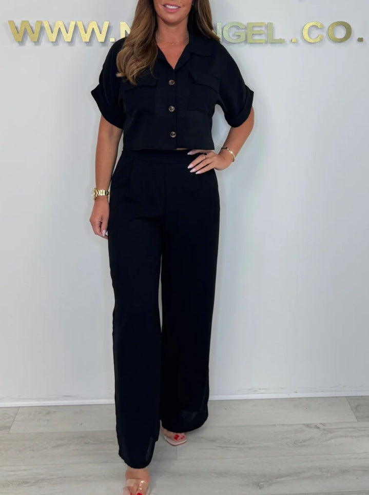 Dame Lagdelt Jumpsuit med Kortærmer og Dekorative Knapper Stilla