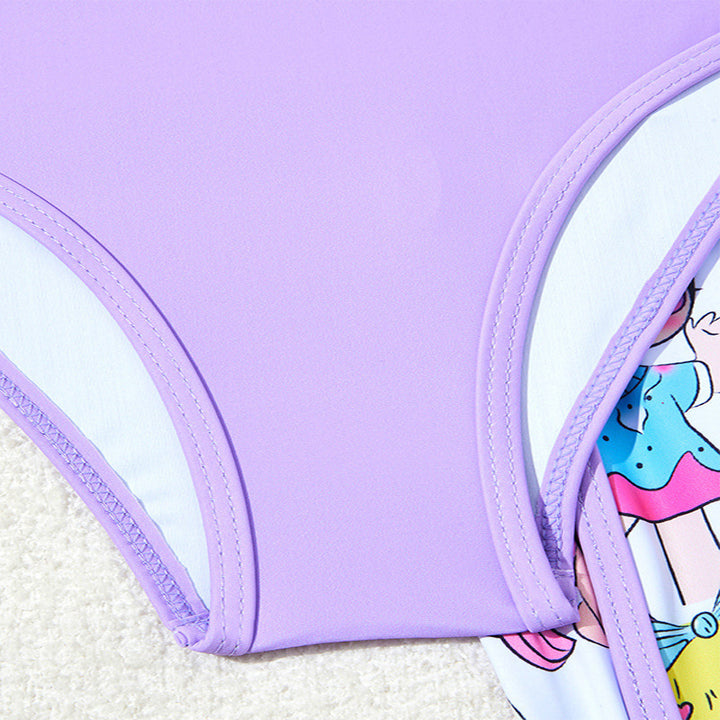 Dame one-piece badedragt med legende motiv og moderigtige shorts Stilla