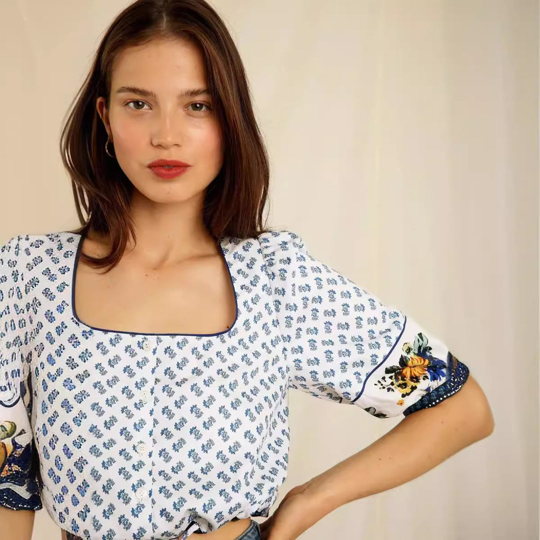 Dame kortærmet bluse med romantiske blomsterbroderier og løs silhuet Stilla