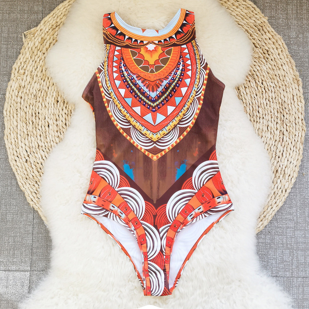 Dame one-piece badedragt med tribal-inspireret mønster og høj krave Stilla