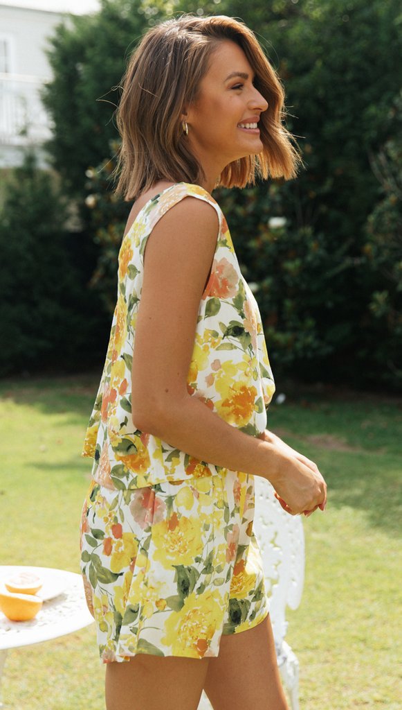Kvindernes blomsterprint jumpsuit med V-hals og elastisk talje Stilla