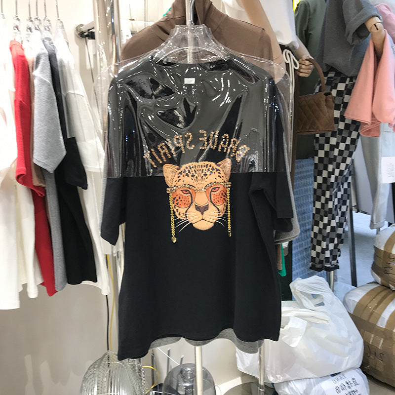 Dame T-shirt med moderigtigt leopardmotiv og glitterende accenter Stilla