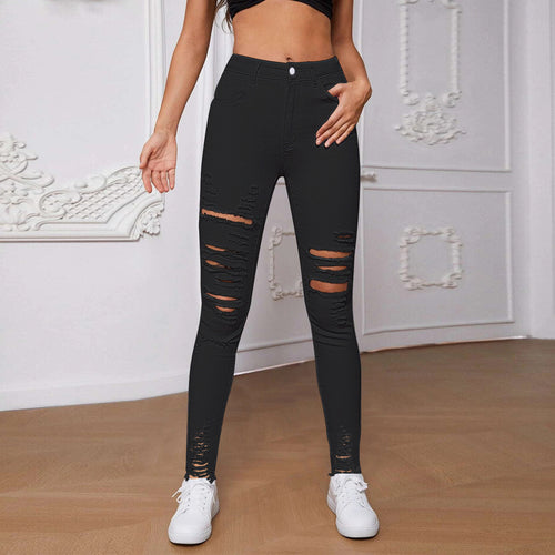 Dame højt skårne skinny jeans med trendy riv detaljer og figurskabende design Stilla