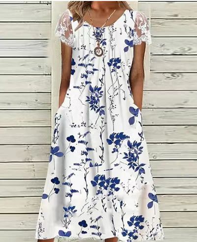 Dame sommerligt fritidskjole med spidsærmer og original blomstertryk Stilla