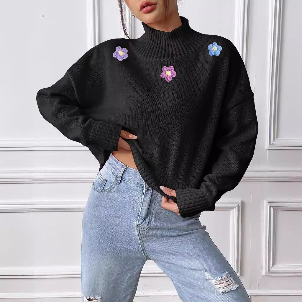 Dame elegant strikpullover med blomstret design og høj krave Stilla