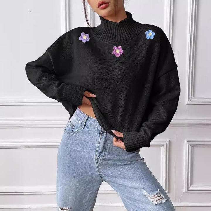 Dame elegant strikpullover med blomstret design og høj krave Stilla